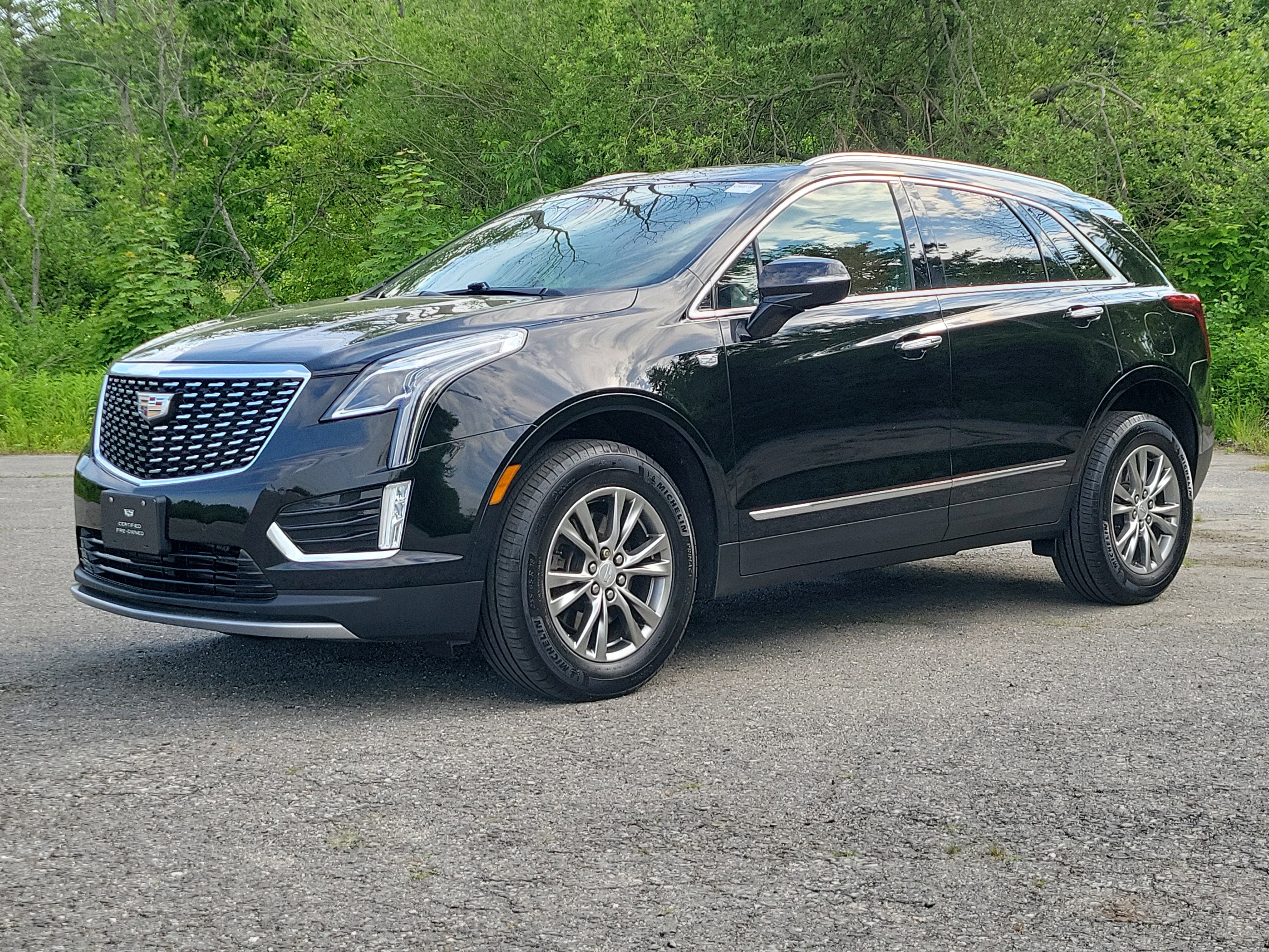 2023 Cadillac XT5 Premium Luxury in Stellar Black Metallic — front three-quarter view